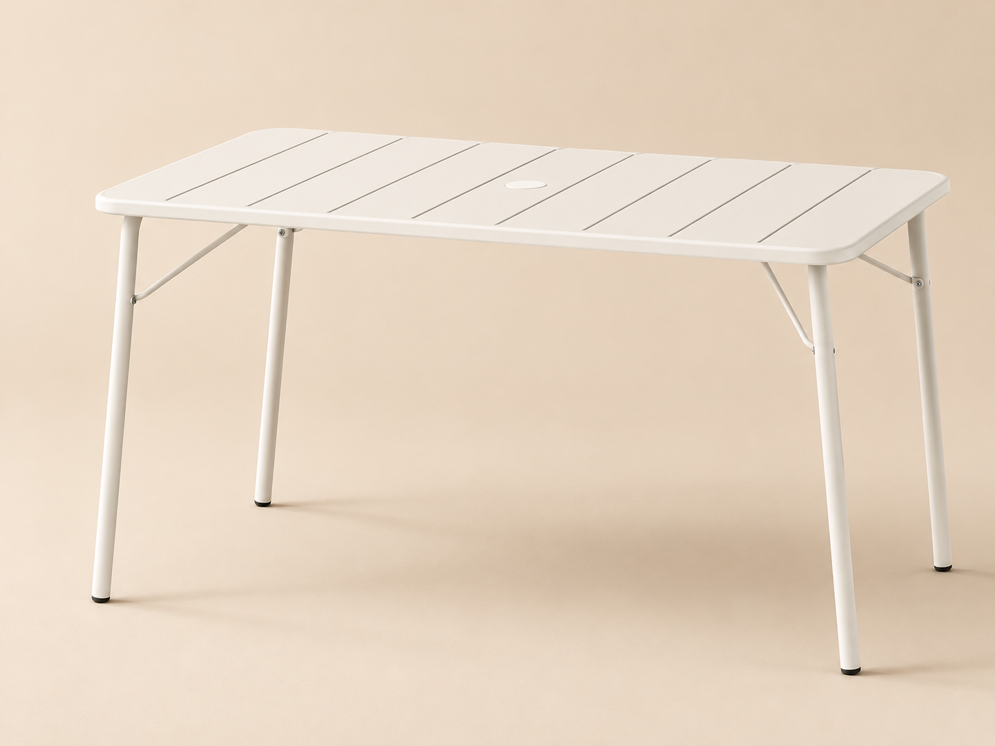 TOVA Outdoor Table with a white slatted rectangular tabletop, rounded corners and four sturdy folding legs.