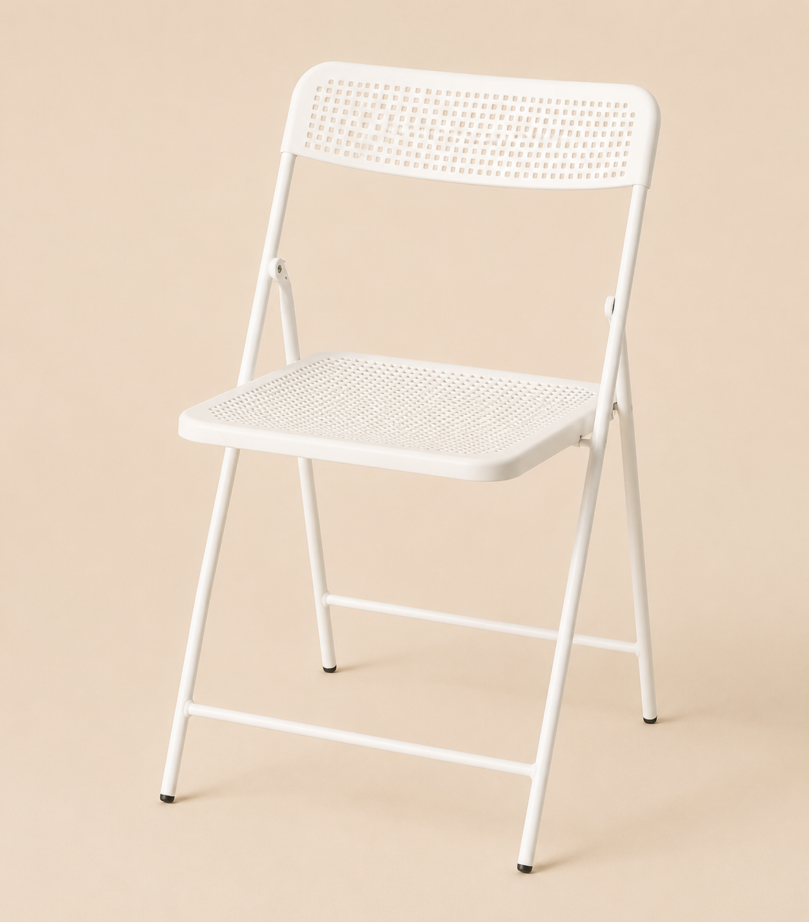 TOVA white folding outdoor chair with perforated seat and backrest on a neutral background