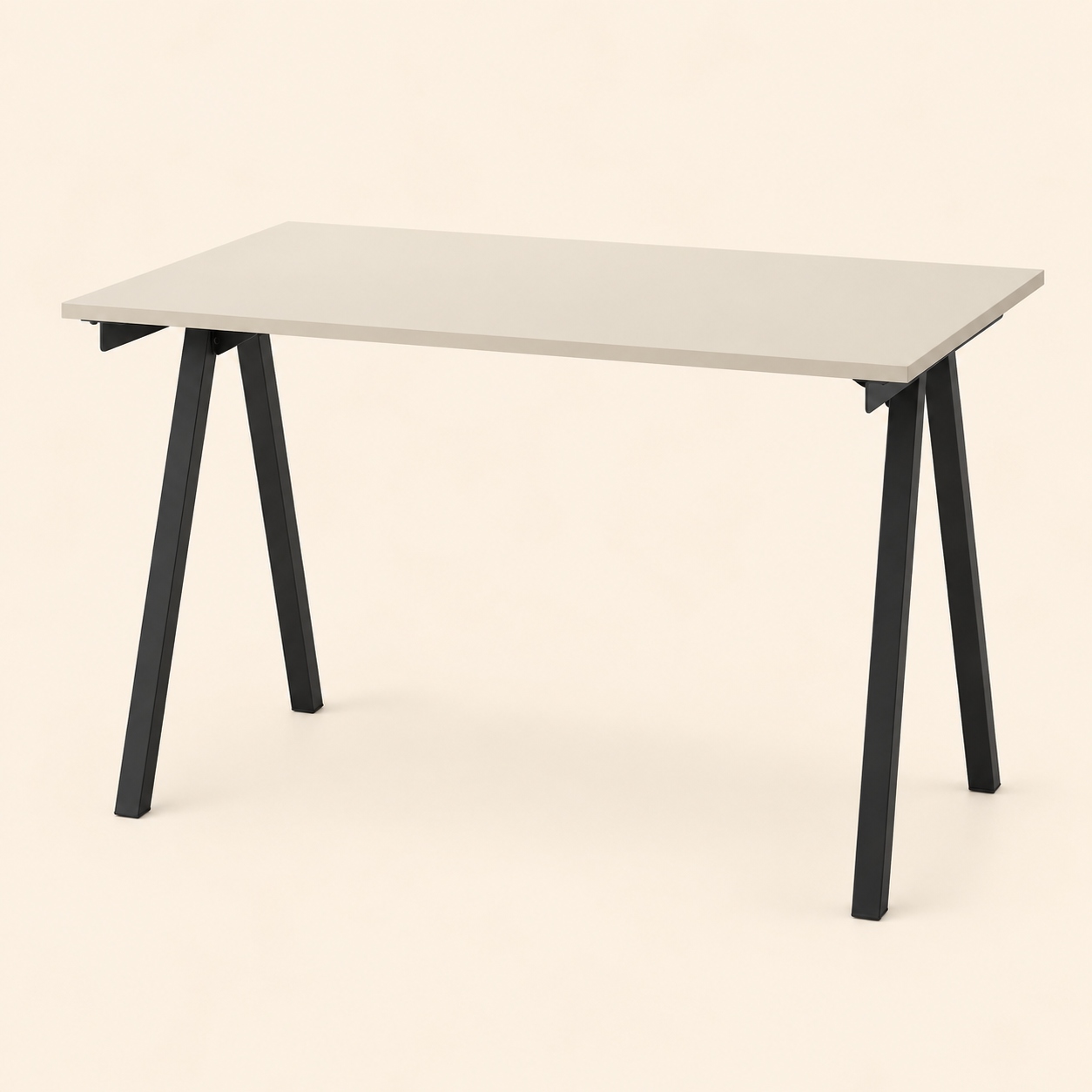 SKARO Office Desk with a clean rectangular tabletop and sturdy black angled steel legs, shown on a plain background.