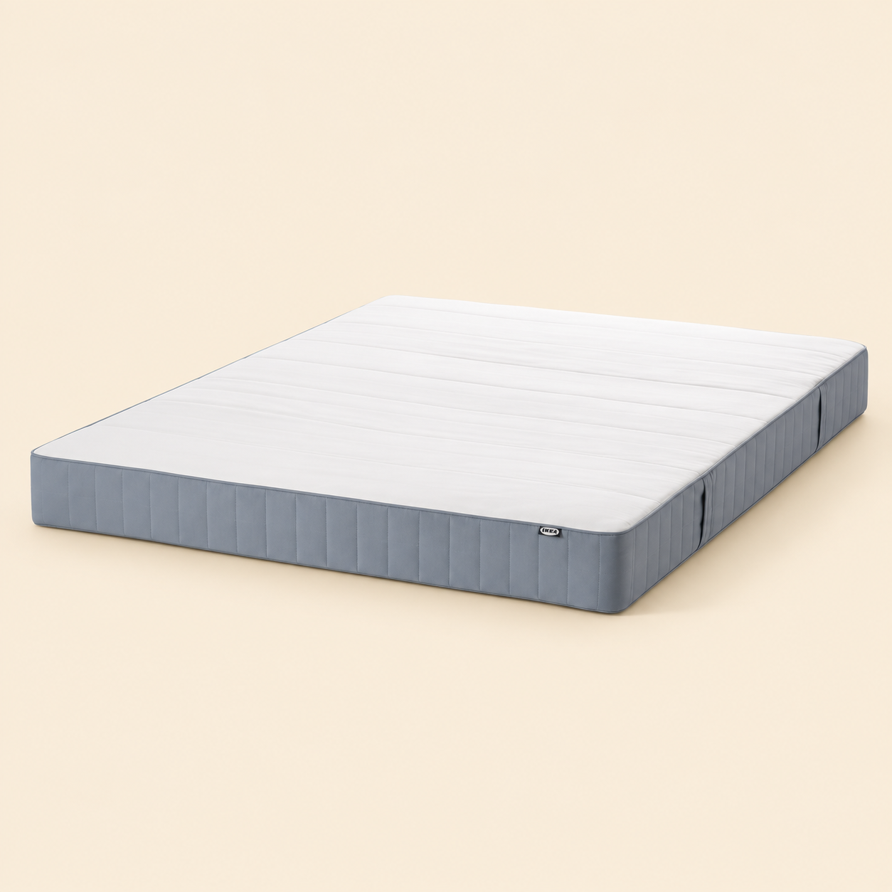 Full view of the king-size NORD 180×200 cm sprung mattress with a white quilted sleeping top and blue-grey side panels against a plain background.
